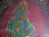Tibet 06 08 Gyantse Kumbum Vajrasattva The Gyantse Kumbum has a wonderful painting of Vajrasattva (Tib. Dorje Sempa), the Bodhisattva of purification who represents the highest emanation of the enlightened mind. His right hand holds a vajra to the heart and his left hand holds an upturned bell topped with a vajra handle at the left hip.